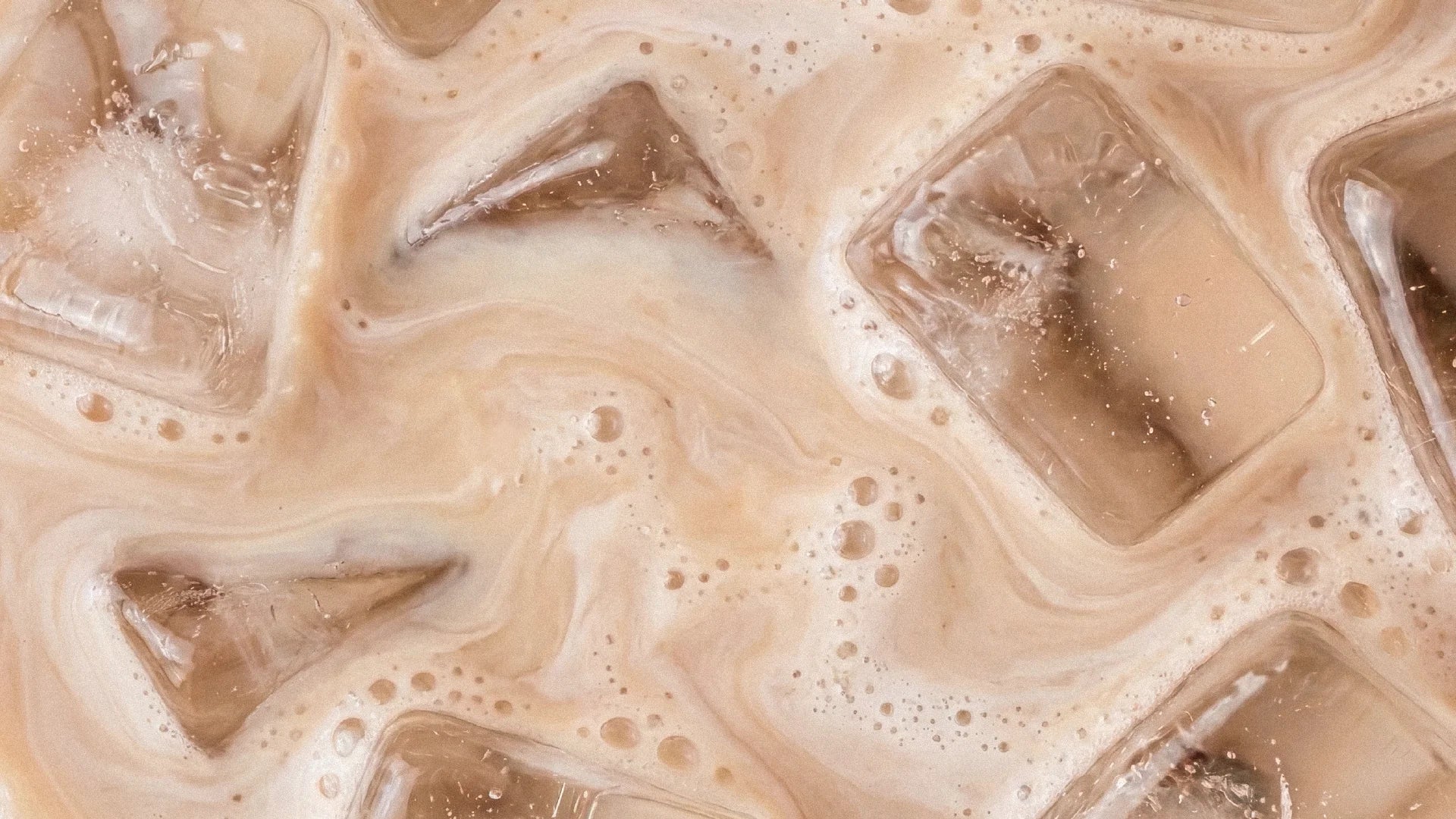 Cookie milk drink on an iced coffee background
